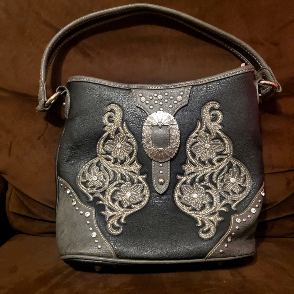 Embroidered and studded purse